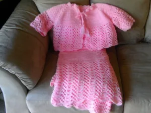 sparkly pink baby blanket with matching sweater hand made crochet gift Christmas Christening hospital homecoming come home best seller